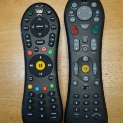 TiVo Roamio remote next to TiVo HD remote