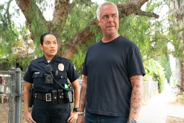Officer Reina Vasquez (Denise G. Sanchez) and Harry Bosch (Titus Welliver) in season two of Bosch Legacy (Photo Credit: Warrick Page)