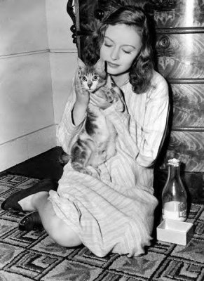 Donna Reed as a young girl with pet cat.jpg