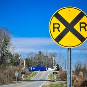 depositphotos_9513431-stock-photo-railroad-crossing-sign.jpg